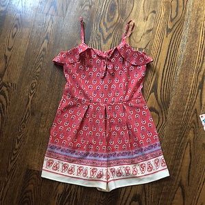 Coral colored romper in size small